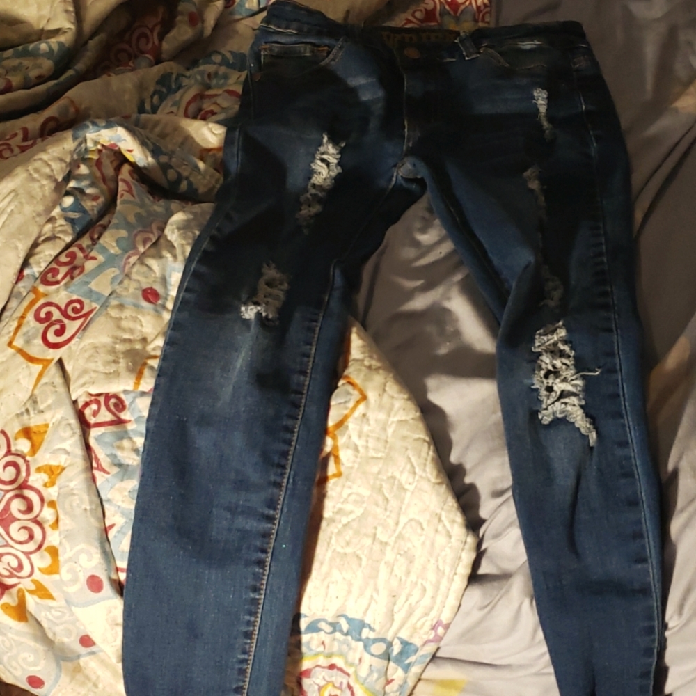 Write never worn girl ripped jeans